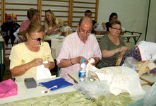 Spanische und slowenische Spitzenmacher